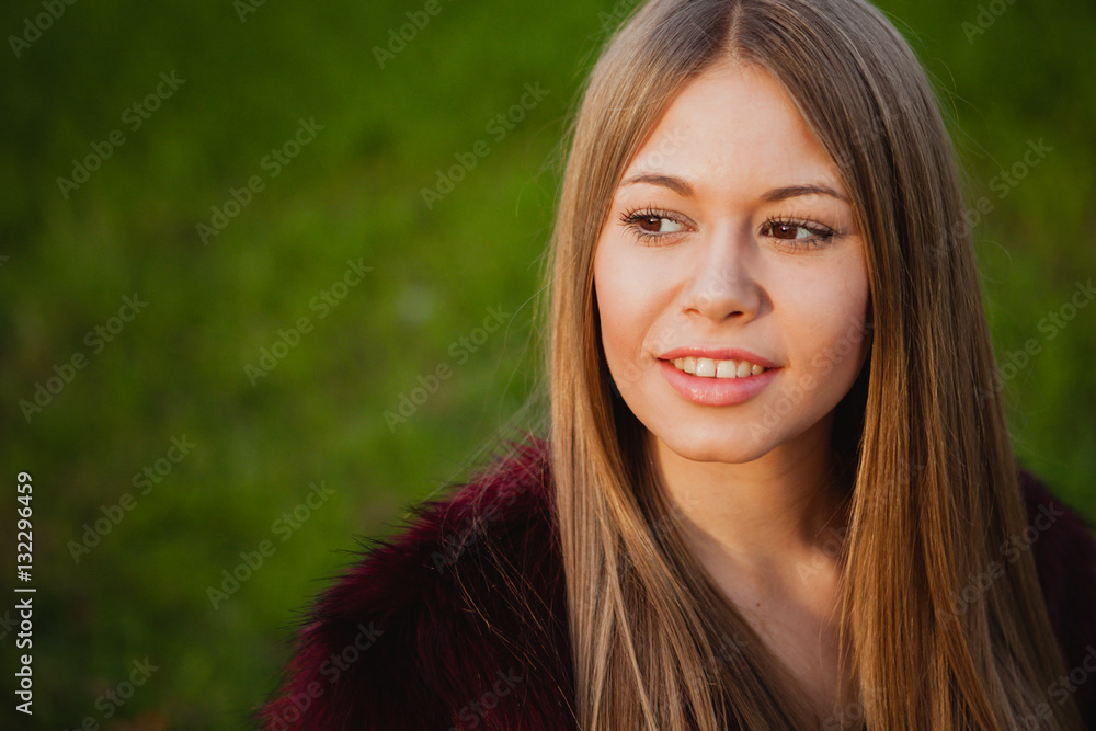 Fototapeta premium Beautiful portrait of a blonde girl