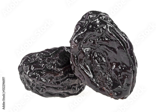 Smoked prunes isolated on a white background, close-up