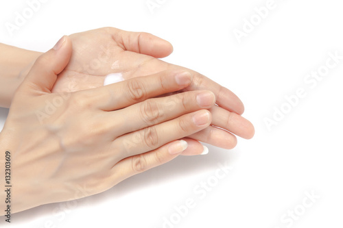 Obraz na płótnie Apply small amount of body lotion to moisture the palm skin on white background isolated w salonie