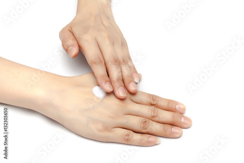 Obraz na płótnie Apply small amount of body lotion to moisture the hand skin on white background isolated w salonie