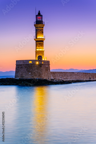 Venetian lighthouse in Chania port at sunrise, Crete, Greece