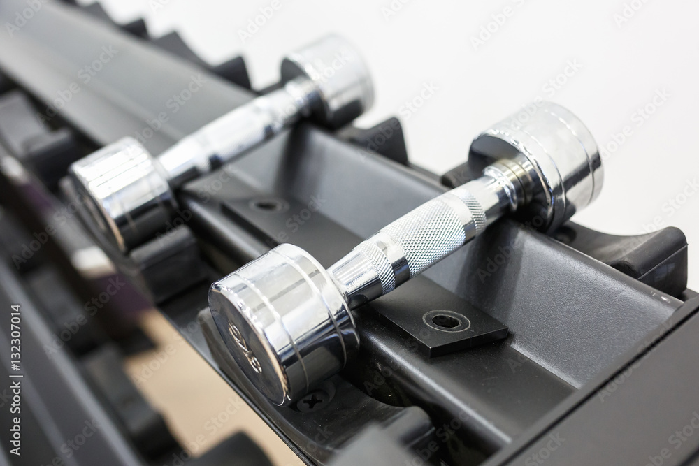 Different weight dumbbells. Sports Equipment Different weight dumbbells. Sports Equipment