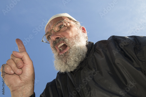Photography elder muslim with raised finger