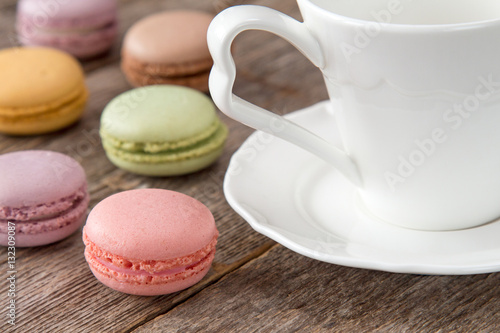 Macaroons with cup of coffee