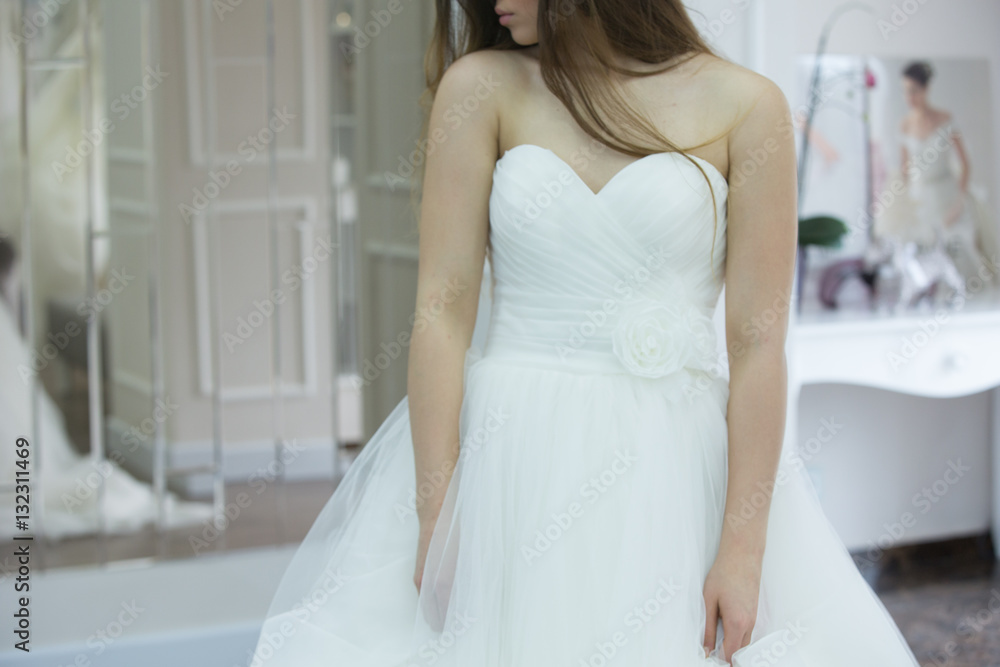 Bride white wedding dress, shallow focus, tulle cloth Bride white wedding dress, shallow focus, tulle cloth