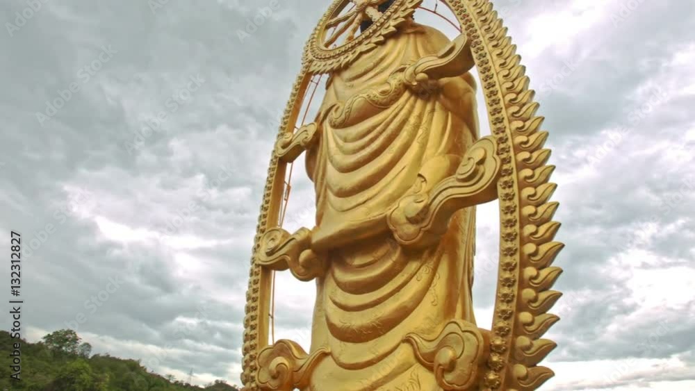 Side Golden Statue on Observation Plot in Buddhist Temple Side Golden Statue on Observation Plot in Buddhist Temple