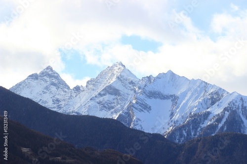Alpine peaks in winter sunny day 