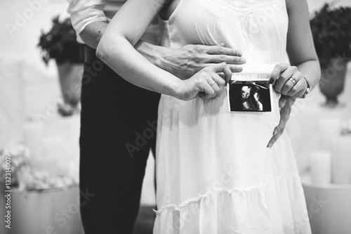 Baby on board photo session, pregnant couple, abstract, black and white