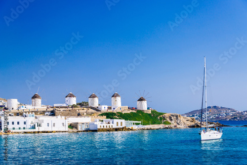 Romantic famous windmills of Mykonos on a bright summer day, Mykonos, Cyclades, Greece