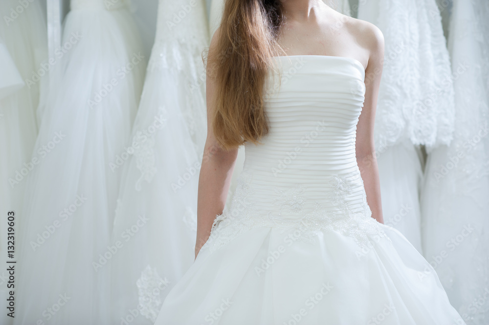 Wedding bridal white dress in the showroom fashion, abstract Wedding bridal white dress in the showroom fashion, abstract