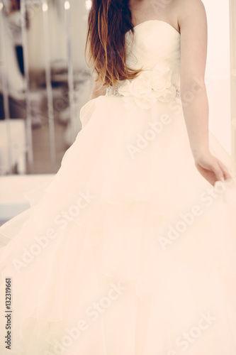 Wedding bridal white dress in the showroom fashion, abstract, vintage verticle