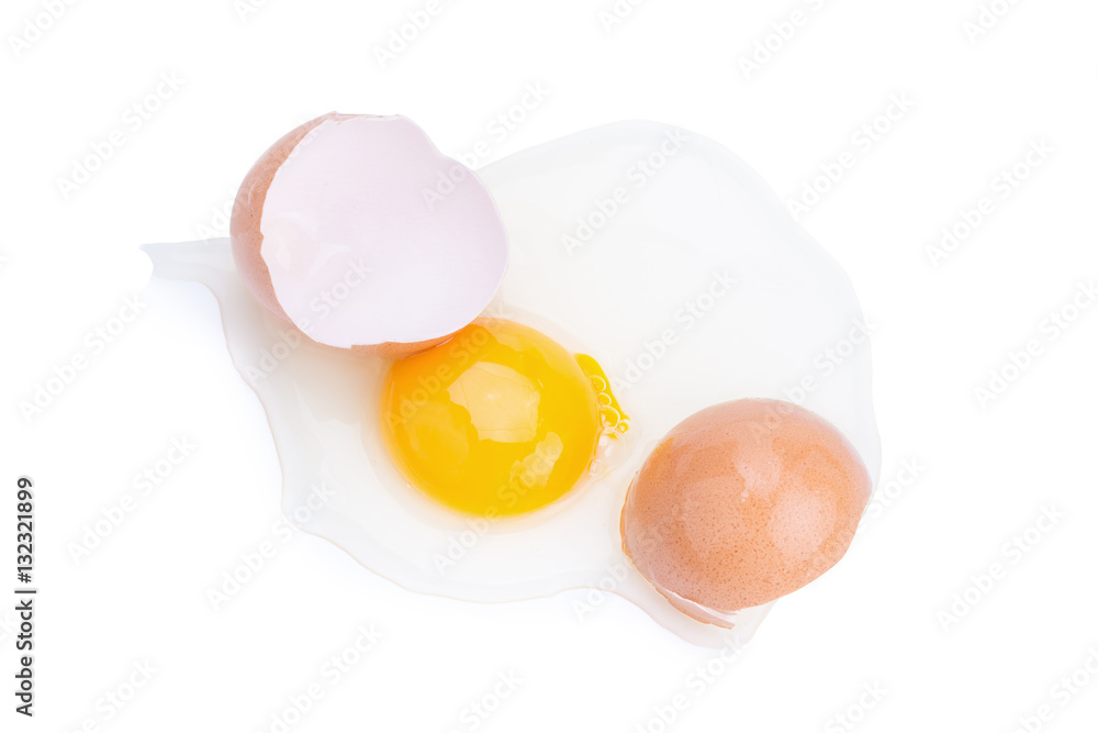 Close up of cracked egg on white background. Close up of cracked egg on white background.