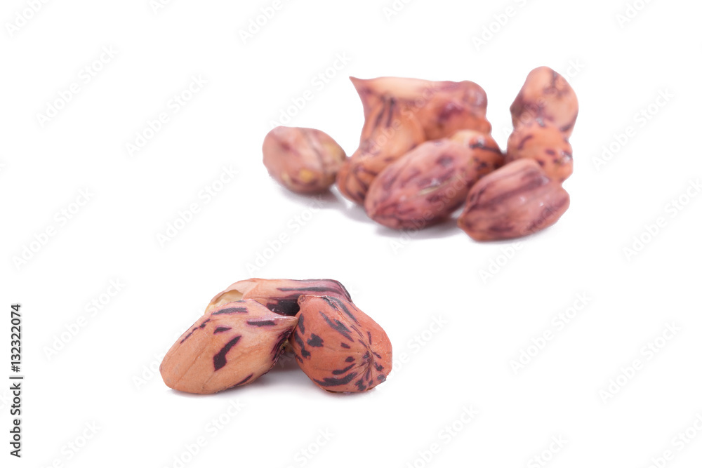 Roasted tiger peanuts on white background. Roasted tiger peanuts on white background.