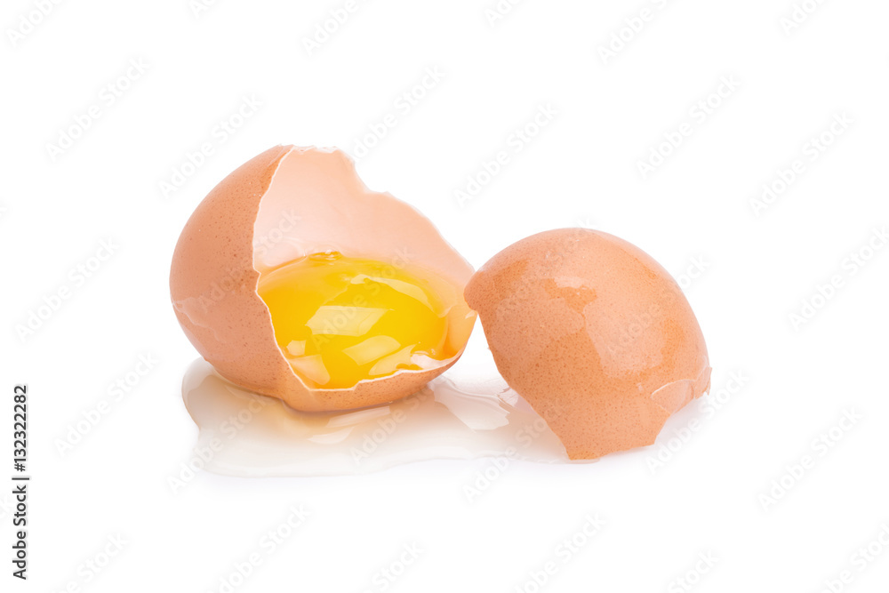 Close up of cracked egg on white background. Close up of cracked egg on white background.