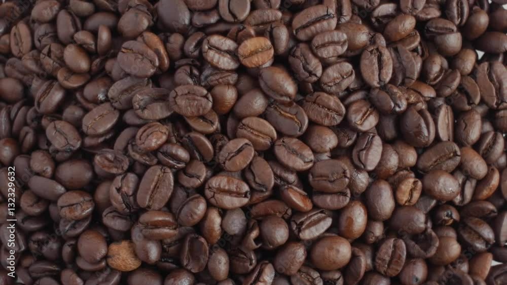 coffee beans on rotating stand closeup, slow motion coffee beans on rotating stand closeup, slow motion