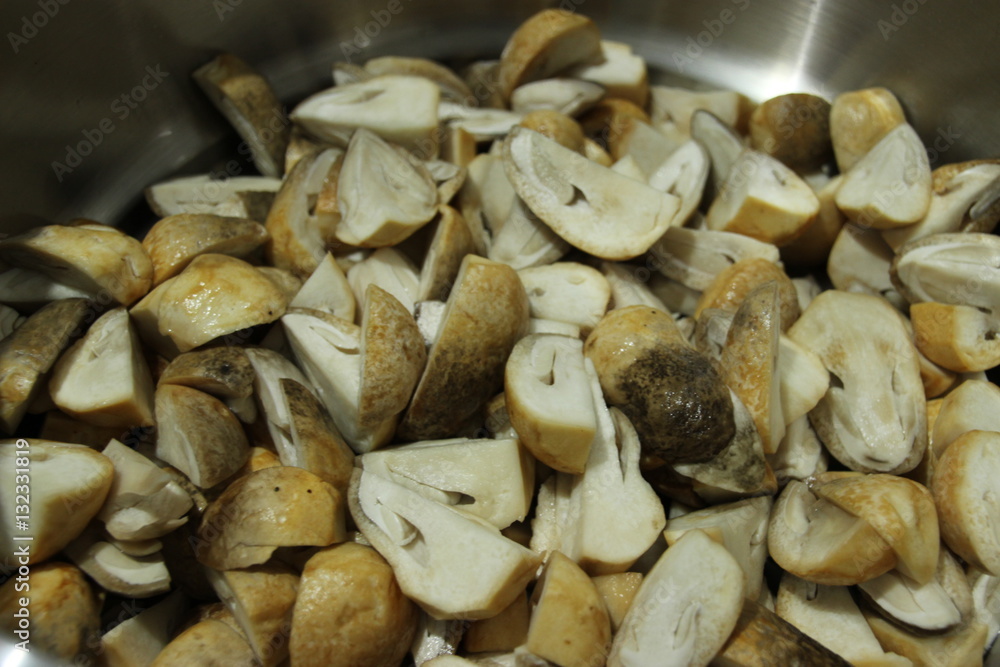 cut mushrooms in big pot cut mushrooms in big pot