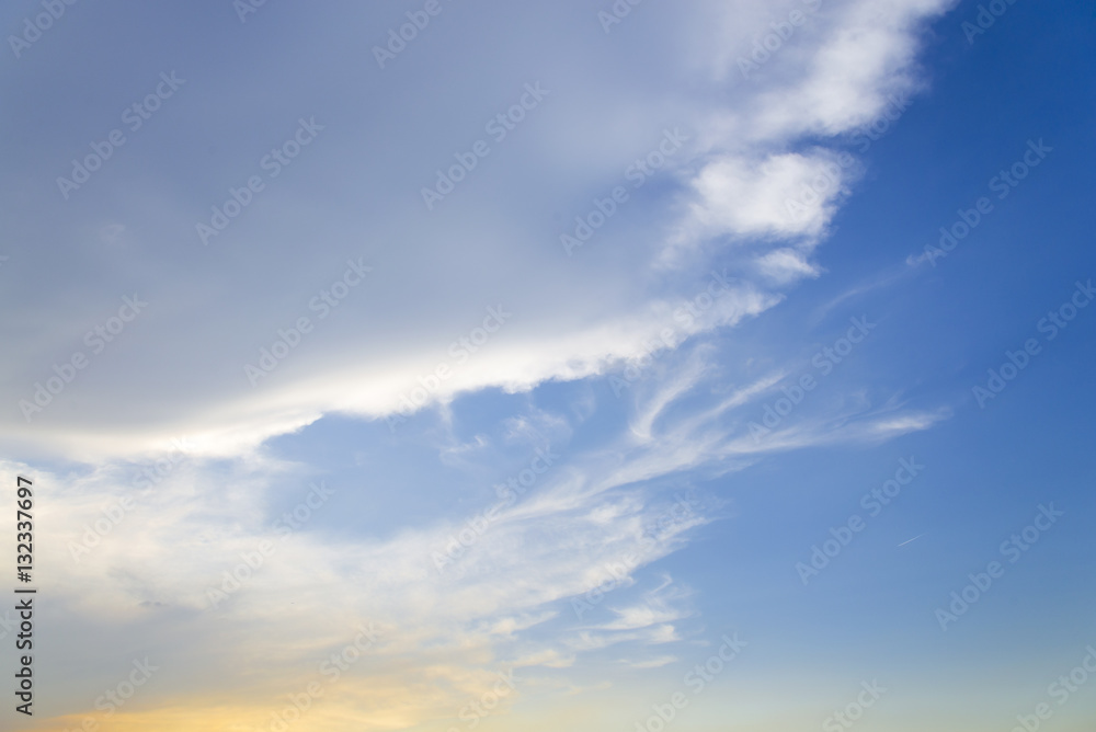 Blue sky with closeup white fluffy clouds background and pattern