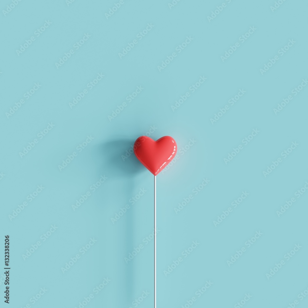 Tiny red heart balloon concept on pastel blue background. minimal concept.