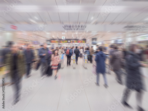 Fast motion blur, people go to train station in rush hour at Jap