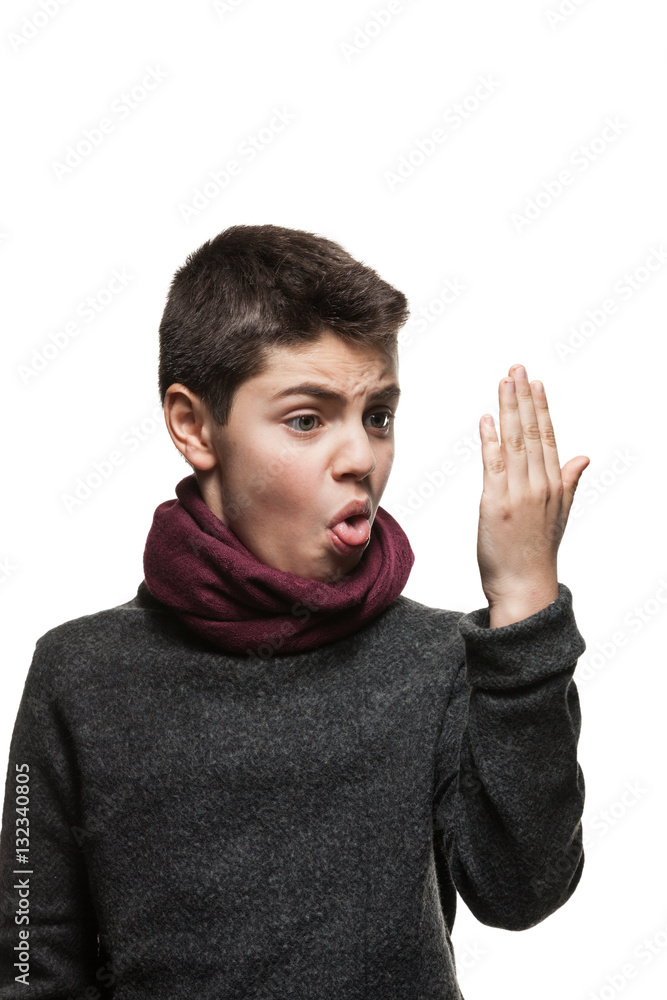 Boy watches the palm of his hand Photos Adobe Stock
