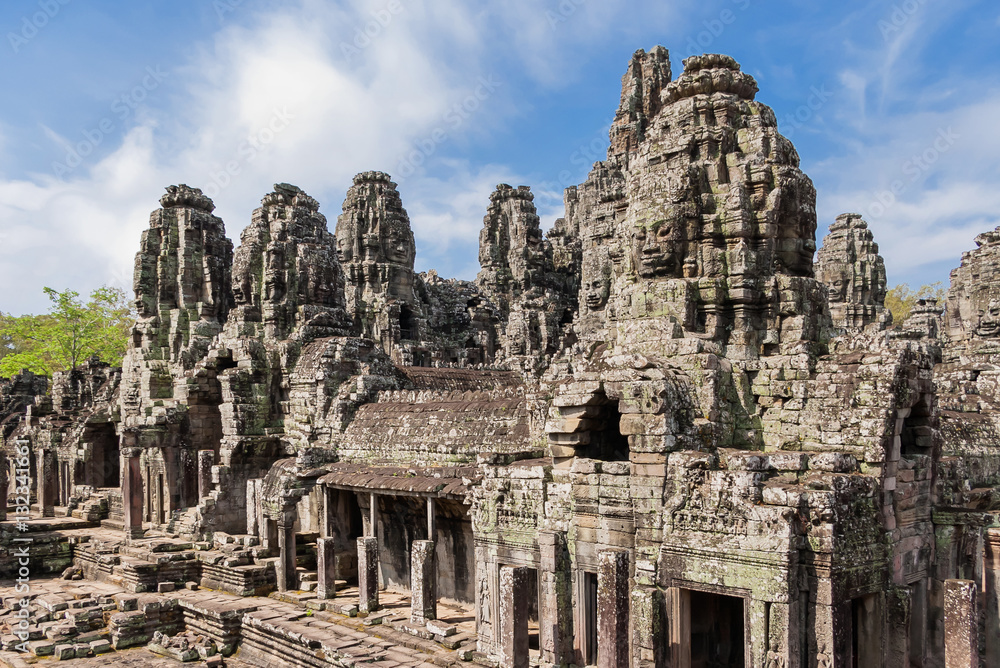 Towers with faces in Angkor Wat, temple complex in Cambodia and the largest religious monument in the world. UNESCO World Heritage Site.
