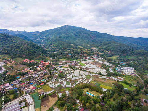 Aerial View of Small Village among Mountains.