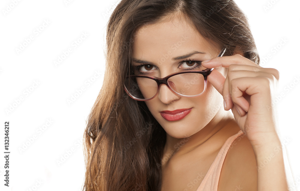 young woman posing with glasses