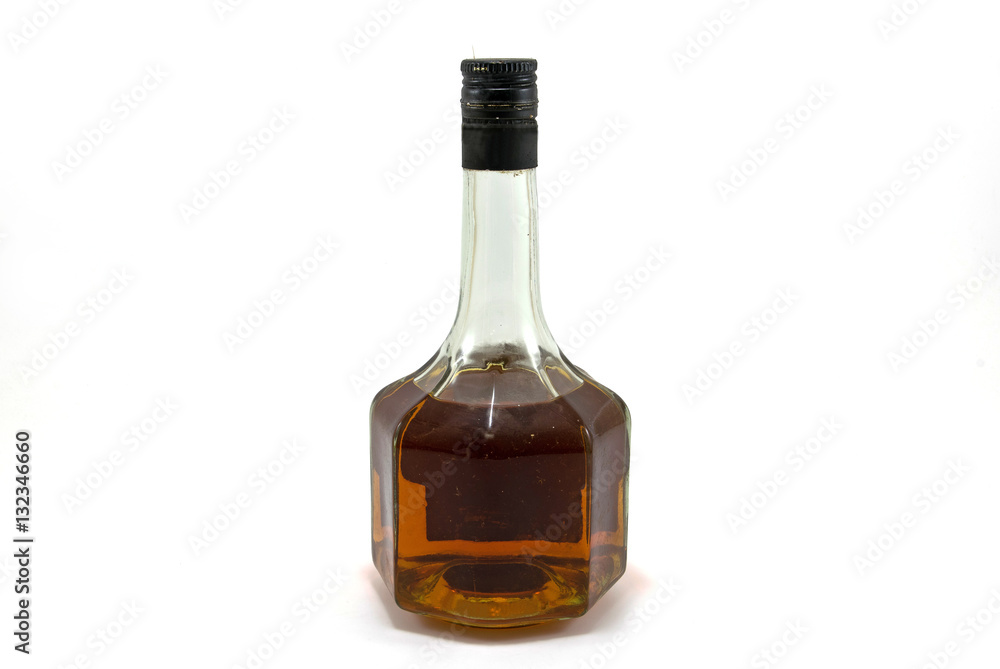 Old whiskey in beautiful bottle on white background. Old whiskey in beautiful bottle on white background.