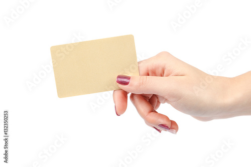 Beautiful female hand with manicure holds gold card