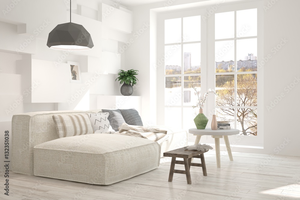 Modern interior design with sofa and urban landscape in window