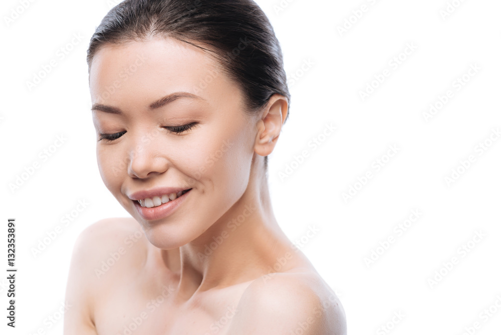 Delighted attractive woman closing her eyes Delighted attractive woman closing her eyes