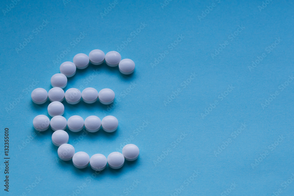 Pills isolated on blue background