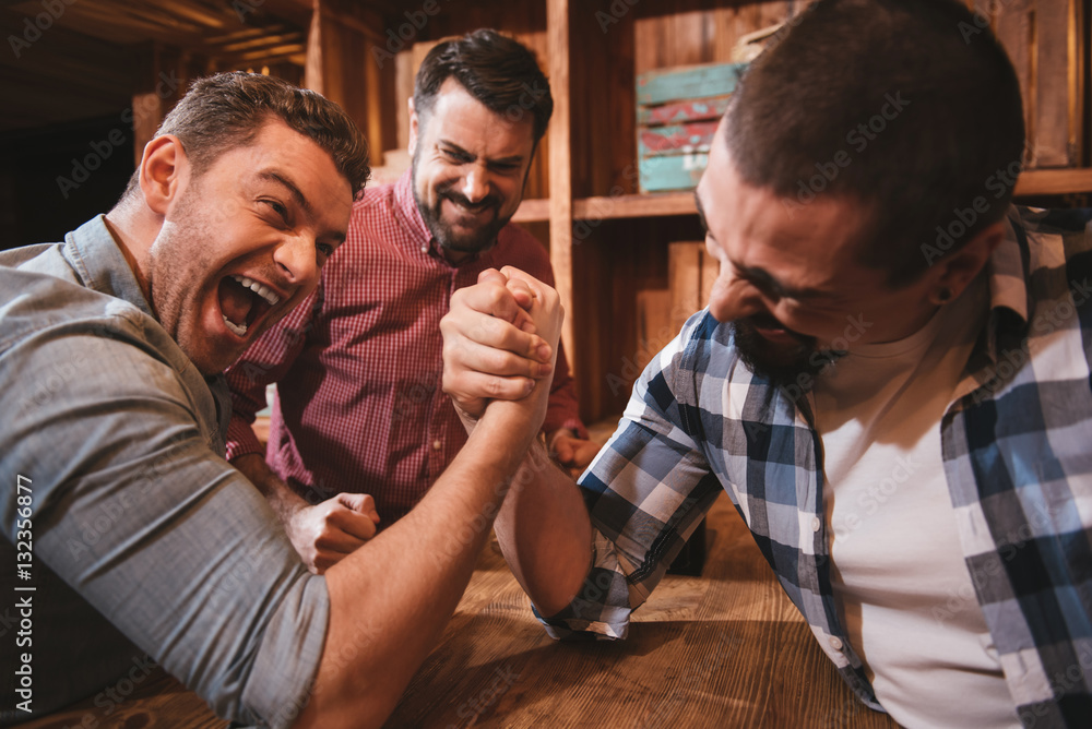 Fototapeta premium Good looking attractive men confronting each other