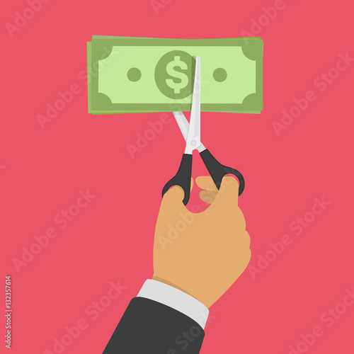 Hand cutting money bill.