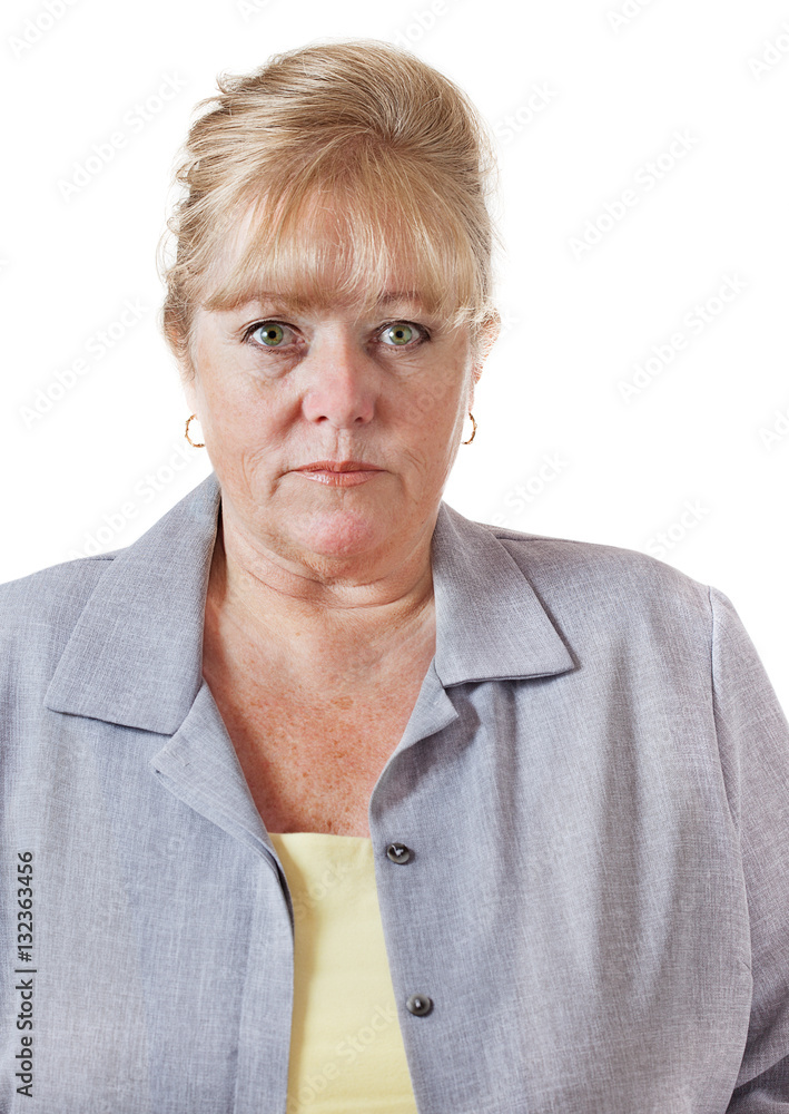 Late 50s woman with hair up, comfortable looking her age Late 50s woman with hair up, comfortable looking her age