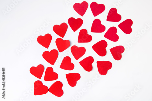 Red hearts on a white background - for decoration on Valentine's Day