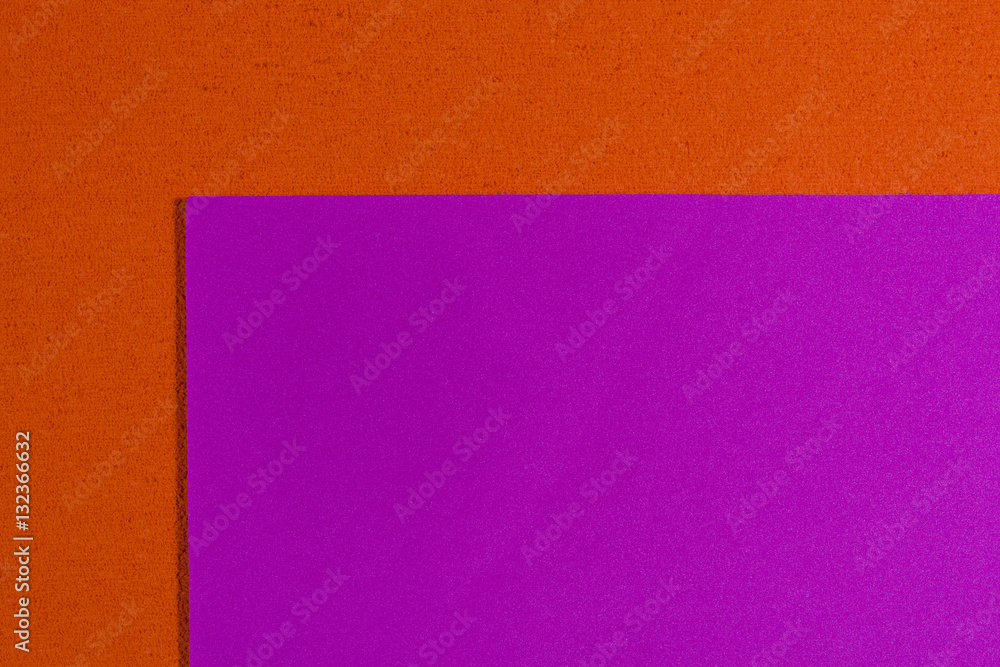 Fototapeta premium Eva foam ethylene vinyl acetate smooth pink surface on orange sponge plush background