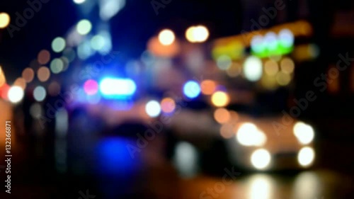 police cars on the street, security patrol, accident road control by policeman aka cop, crime control, blue sirene blinking on night street, emergency aka paramedic car, catastrophe investigation