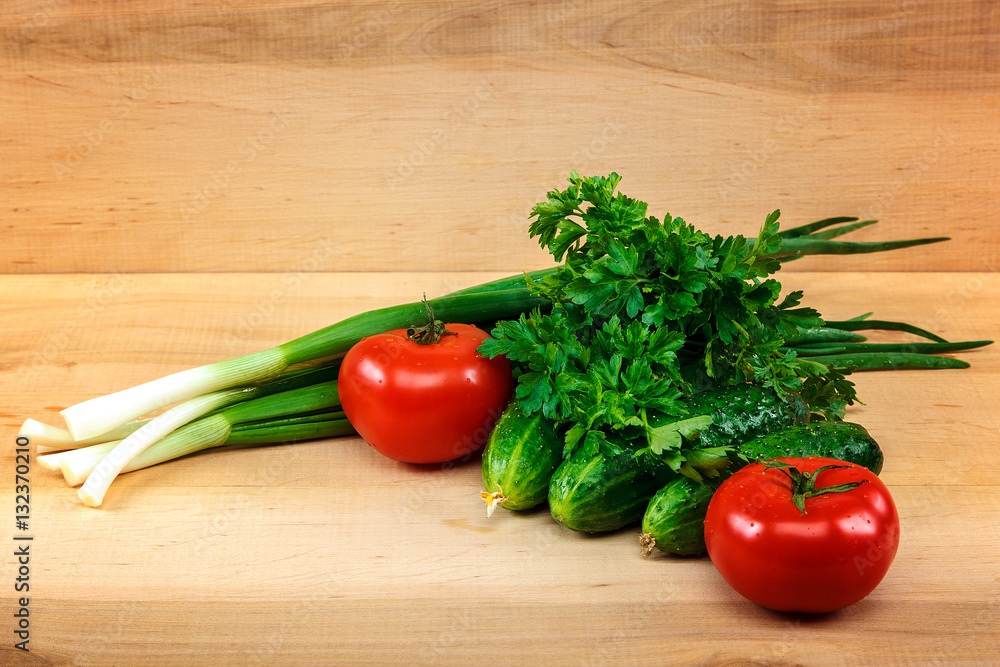 Fresh vegetables on the a wooden background. Fresh vegetables on the a wooden background.