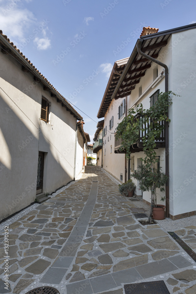 Narrow medieval street in Smartno village, Slovenia.