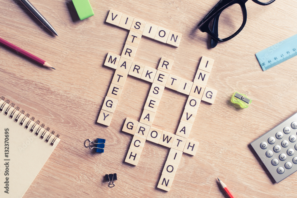 Conceptual business keywords on table with elements of game making Conceptual business keywords on table with elements of game making
