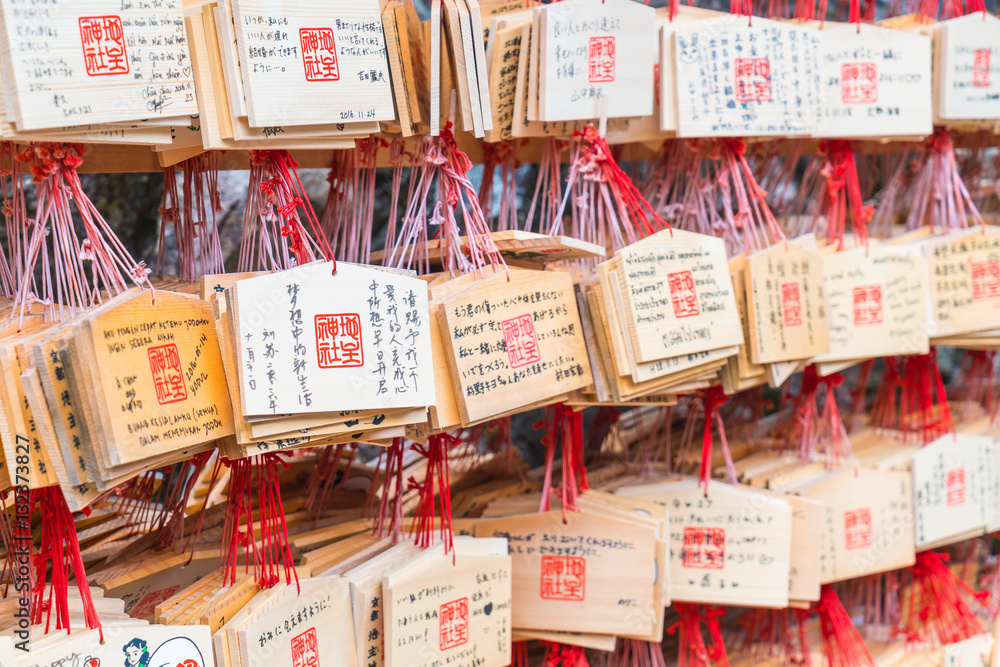 Fototapeta premium Fortune teller paper strip in temple