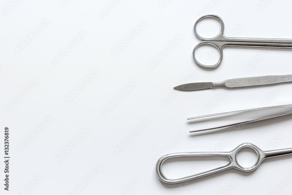 instruments for cosmetic surgery on white background top view instruments for cosmetic surgery on white background top view