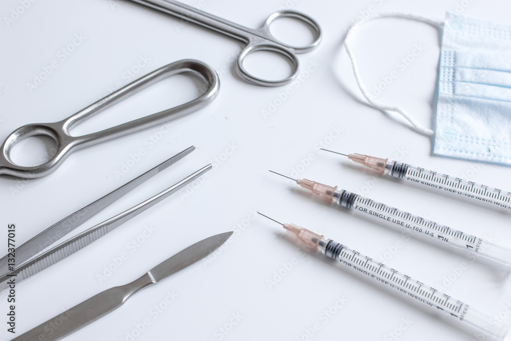 instruments for plastic surgery on white background instruments for plastic surgery on white background