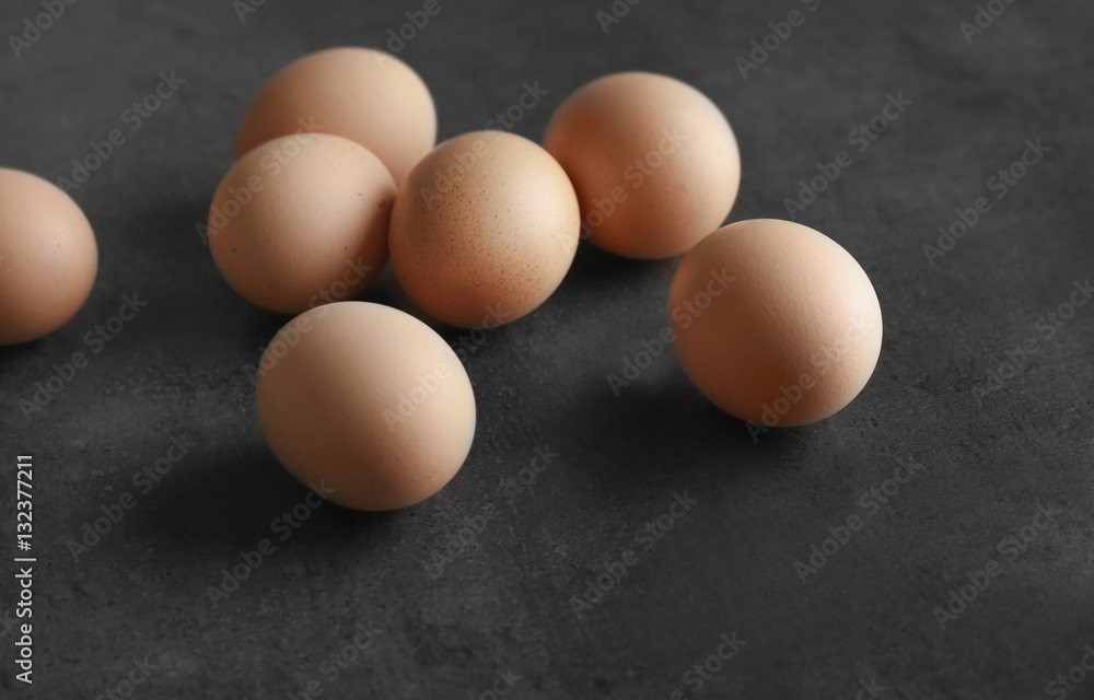 Raw eggs on color background Raw eggs on color background