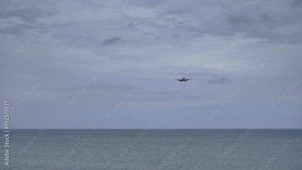 Airplane approaching at Phuket airport Airplane approaching at Phuket airport