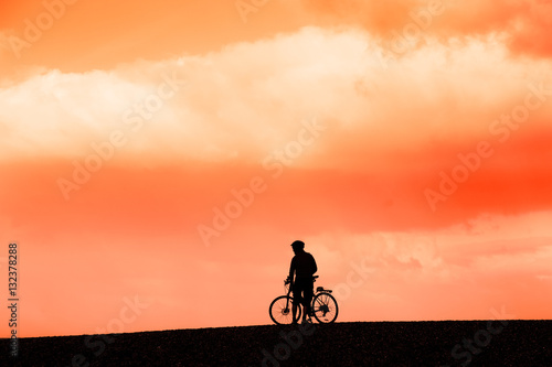Mountain biker on Cley beach Norfolk