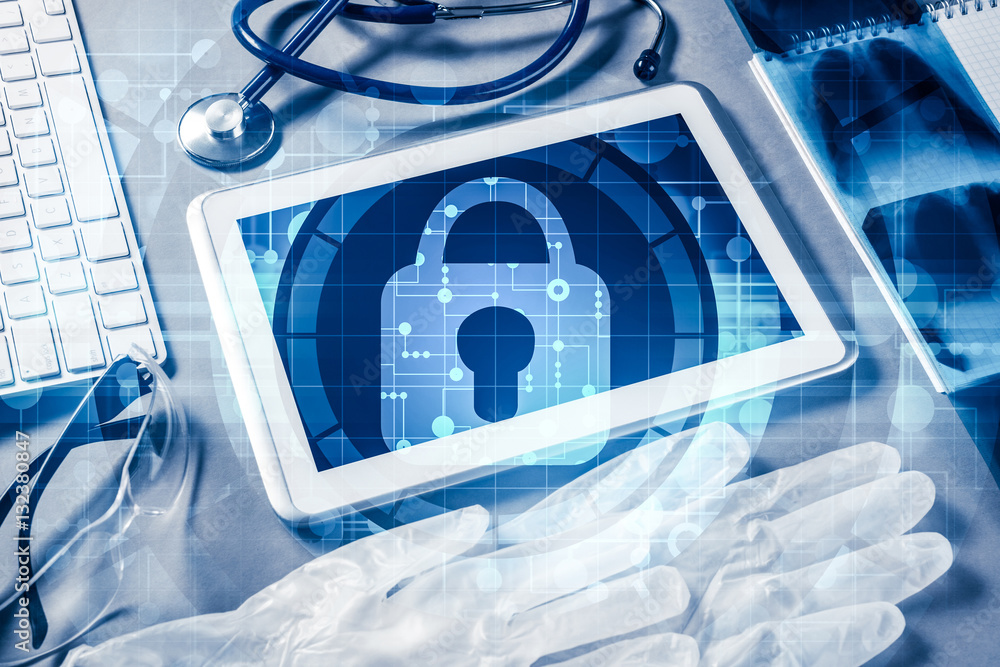Top view of doctor workplace with tablet pc and medicine tools o Top view of doctor workplace with tablet pc and medicine tools o