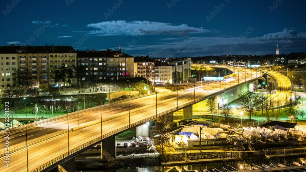 Time Lapse of highway bridge at night. Late night traffic passing by Time Lapse of highway bridge at night. Late night traffic passing by
