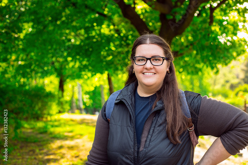 Happy smiling brunette pus size woman